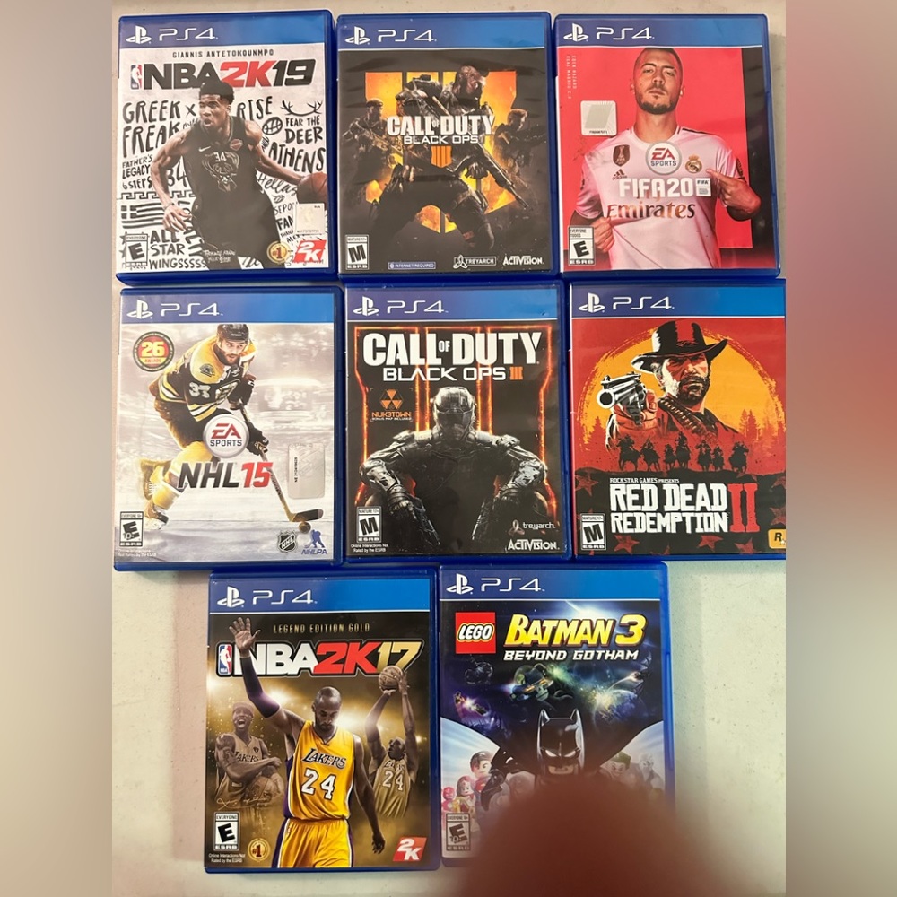 PS4 PLAYSTATION VIDEO GAME SET 8 games & cases